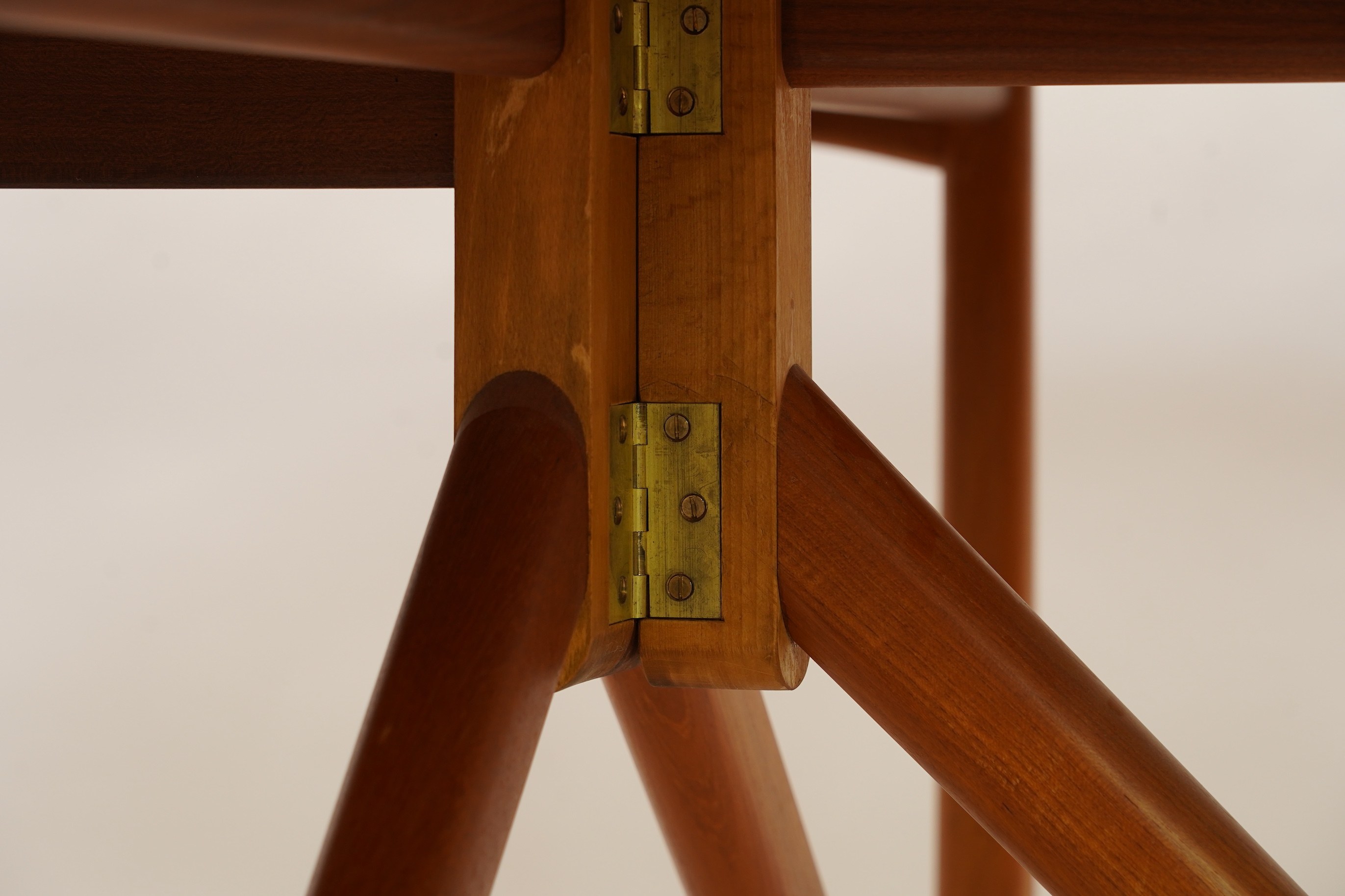 Niels Koefoed (Danish, b. 1929) for Koefoeds Møbelfabrik: A teak 'Oval Klap' dining table